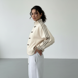 Yúmei Track Jacket | Retro-Sportjacke mit Knopfdetails mit Schlaufen