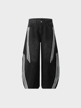 Nyvra Baggy Jeans in Schwarz – Flatlay-Ansicht mit sportlichem Streifen-Akzent und Wide-Leg-Schnitt