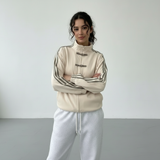 Yúmei Track Jacket Damen Retro-Sportjacke Creme mit Knopfdetails mit Schlaufen