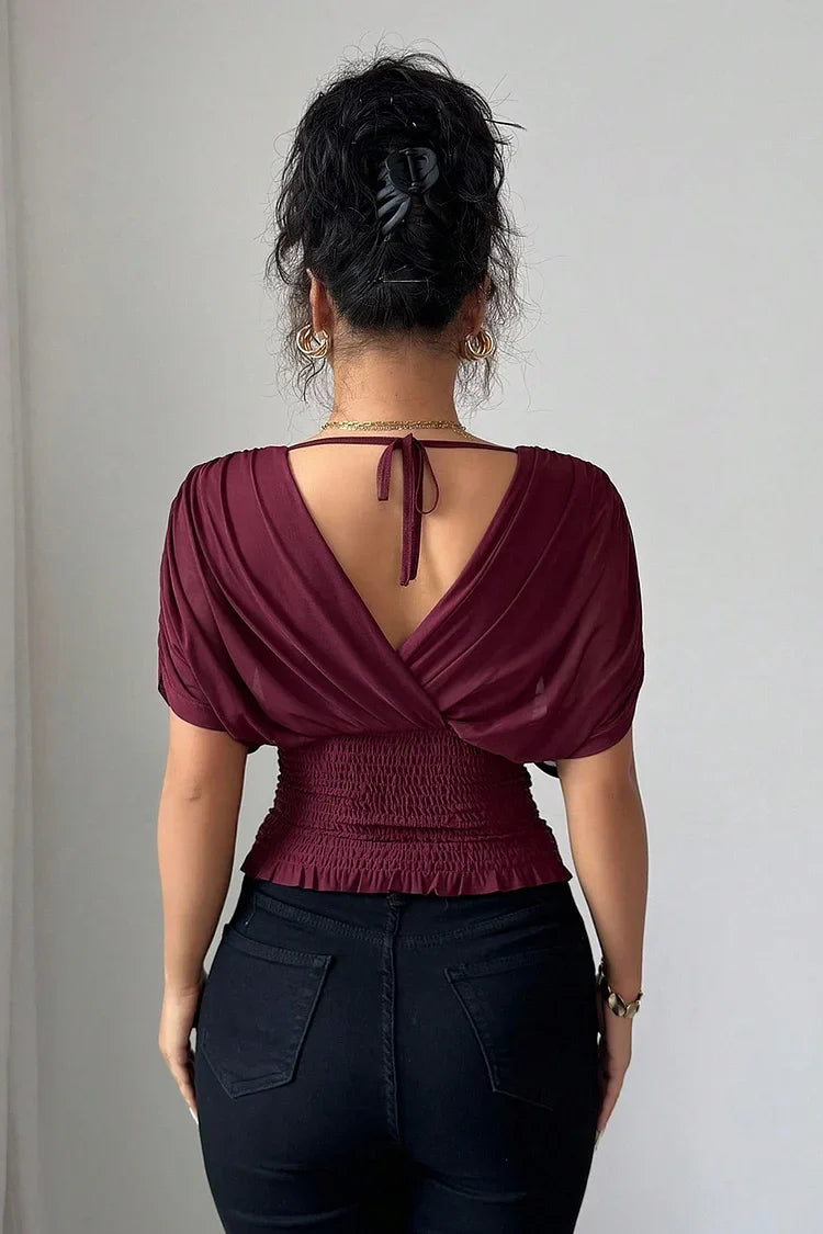 Celestine elegante V-Ausschnitt-Bluse kombiniert für einen festlichen Look