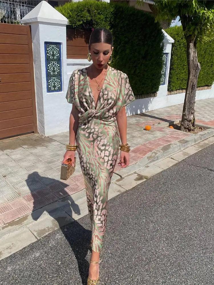 Florielle Midi-Kleid – eleganter Blumenprint mit V-Ausschnitt und Falten