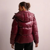 Liorra | Glänzende Damen-Pufferjacke mit Kapuze & warmer Füllung