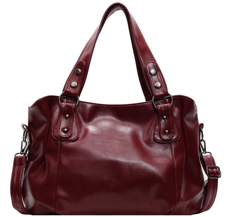 Rote Velmira Vintage Schultertasche von Talaine als Statement
