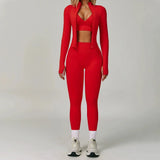 rote sportset damen mit leggings sport bh und jacke studioaufnahme
