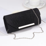 Aurora Charm Clutch Innenraum mit Essentials