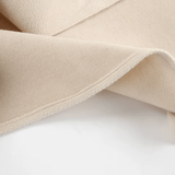 Stoffdetail Dalara Mantel, weiche Struktur
